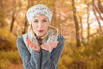 Composite image of happy winter blonde