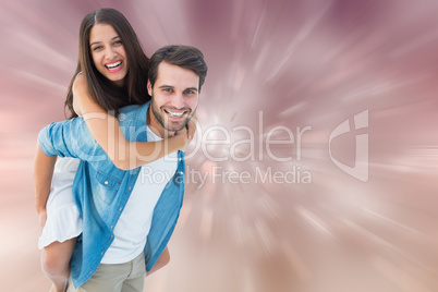 Composite image of happy hipster giving his girlfriend a piggy b