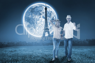 Composite image of happy couple walking holding hands