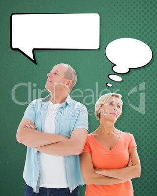 Composite image of thinking older couple with arms crossed