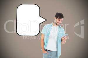 Composite image of happy casual man sending a text message