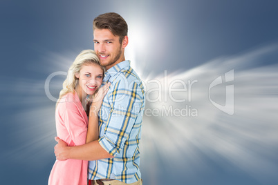 Composite image of attractive couple embracing and smiling at ca