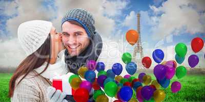 Composite image of winter couple holding gift