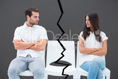 Composite image of angry couple not talking after argument