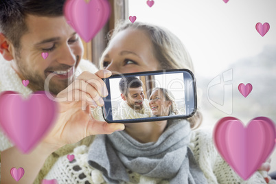 Couple taking Valentines selfie