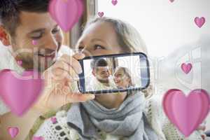 Couple taking Valentines selfie