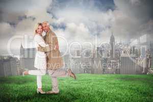 Composite image of happy couple posing in trench coats