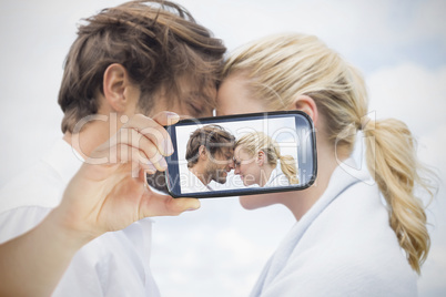 Couple taking selfie on smartphone