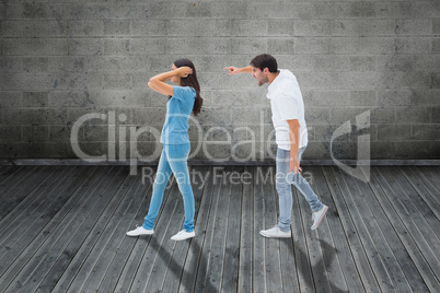 Composite image of angry boyfriend shouting at girlfriend