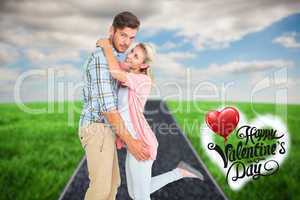 Composite image of handsome man hugging his girlfriend