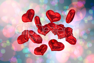 Composite image of heart balloons