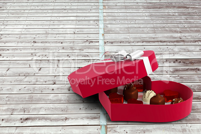 Open red heart shaped candy box