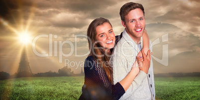 Composite image of portrait of happy young couple