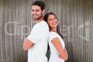 Composite image of happy couple smiling at camera