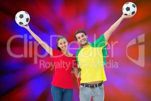 Composite image of football fan couple cheering and smiling at c