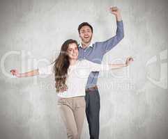 Composite image of portrait of cheerful young couple