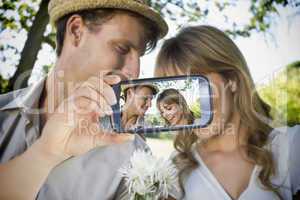 Couple taking selfie on smartphone