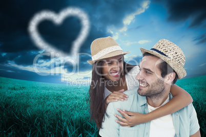 Composite image of happy casual man giving pretty girlfriend pig