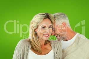 Composite image of happy couple laughing together woman looking