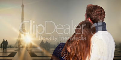 Composite image of close up rear view of romantic couple