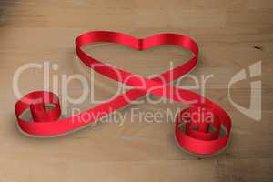 Large red ribbon in a heart shape