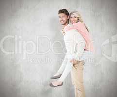 Composite image of handsome man giving piggy back to his girlfri