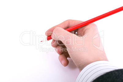 Red pencil in women hand isolated on white background, holds,
