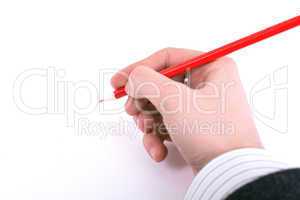 Red pencil in women hand isolated on white background, holds,