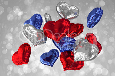 Composite image of heart balloons