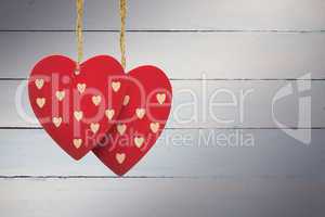 Composite image of cute heart decorations