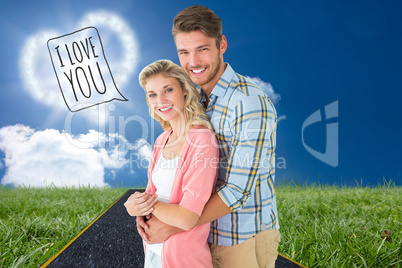 Composite image of attractive couple embracing and smiling at ca