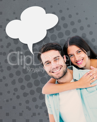 Composite image of happy casual man giving pretty girlfriend pig