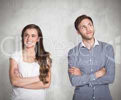 Composite image of smiling young couple with arms crossed
