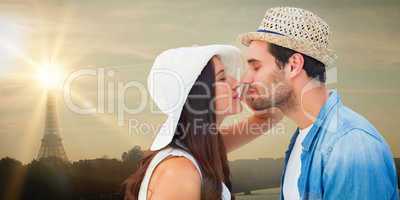 Composite image of happy hipster couple about to kiss