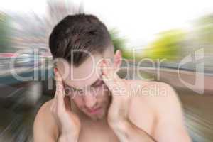 Composite image of man with headache