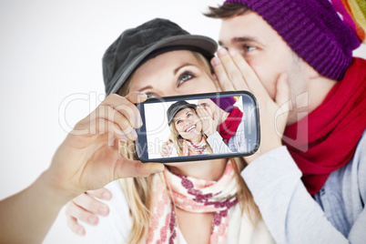 Couple taking selfie on smartphone