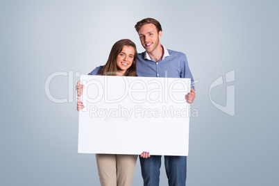 Composite image of full length portrait of couple with blank boa