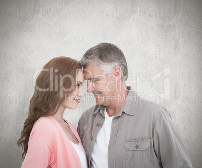 Composite image of casual couple hugging and smiling