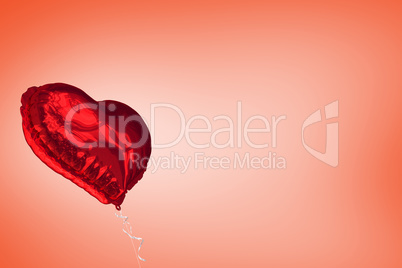 A large red heart balloon