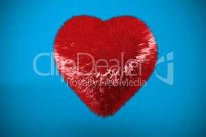 Deep red heart on blue background
