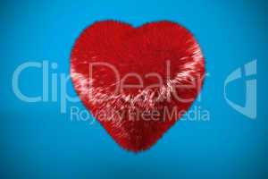 Deep red heart on blue background