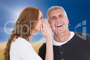Composite image of woman telling secret to her partner