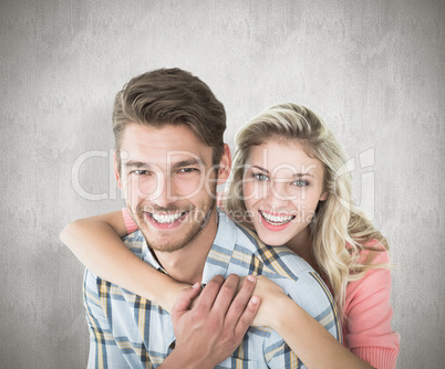 Composite image of attractive couple embracing and smiling at ca