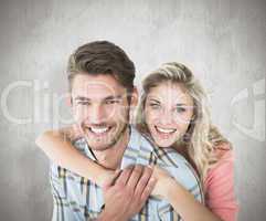 Composite image of attractive couple embracing and smiling at ca