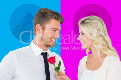 Composite image of handsome man smiling at girlfriend holding a