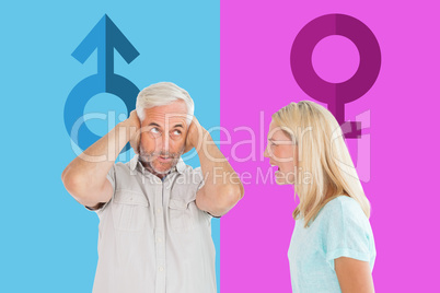 Composite image of unhappy couple having an argument with man no