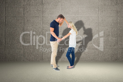 Composite image of angry man overpowering his girlfriend