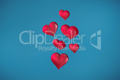 Composite image of floating love hearts