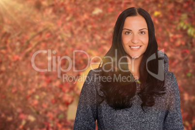 Composite image of woman smiling at the camera