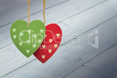 Composite image of cute heart decorations